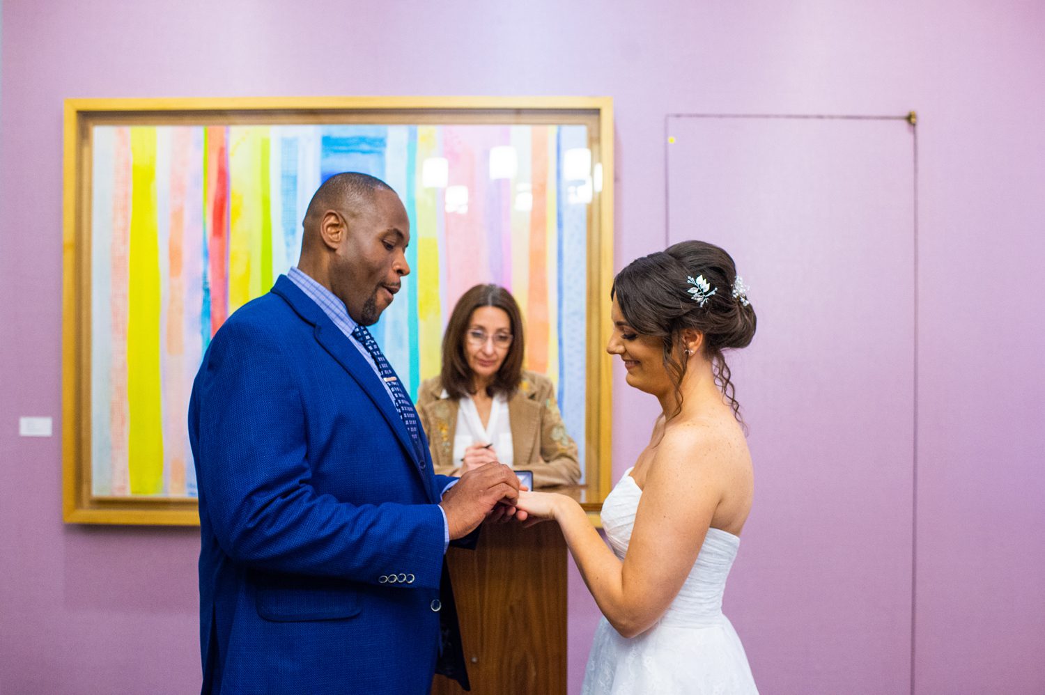 Exchanging Rings at City Hall Wedding 