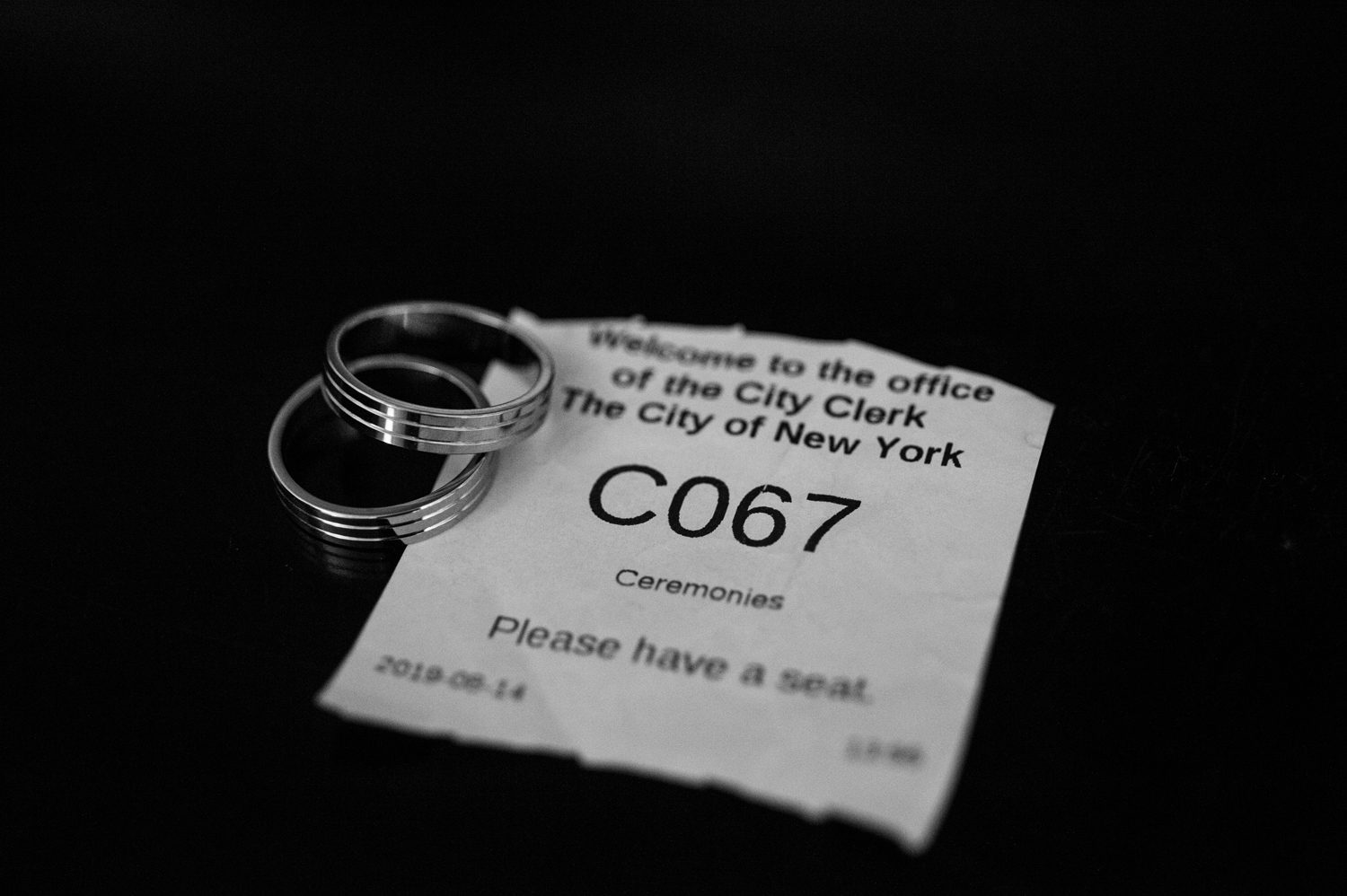 Rings and Wedding Ticket at City Hall 