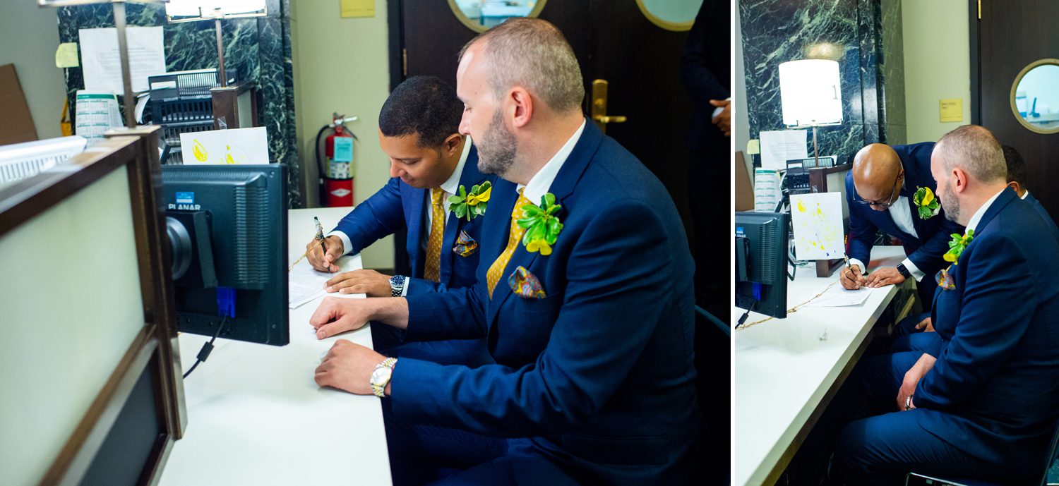 Grooms signing marriage license 