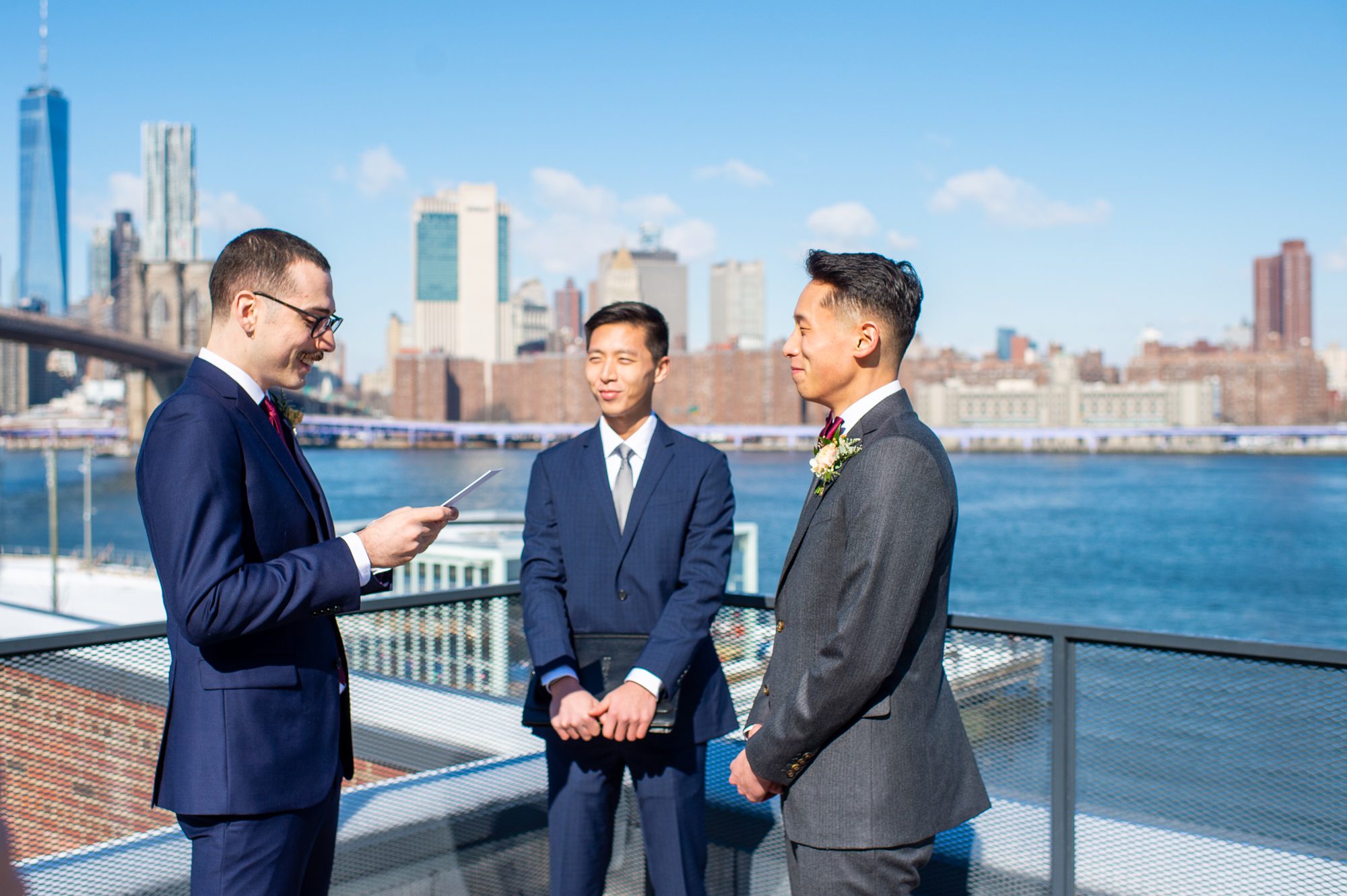 Two Grooms exchanging wedding vows 