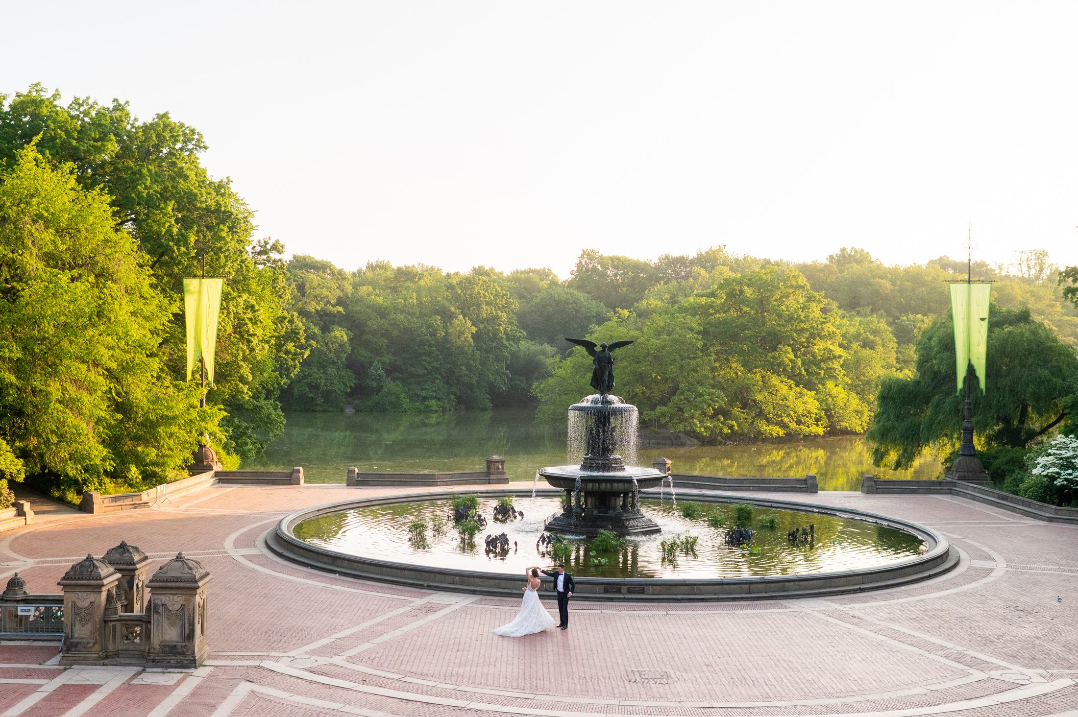 Photo from above of Bride and Groom dancing in front of Bethesda Fountain