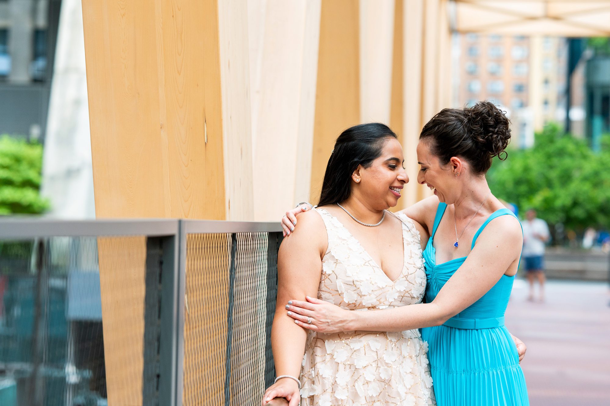 Two brides taking wedding photos on the highline for their NYC Elopement 