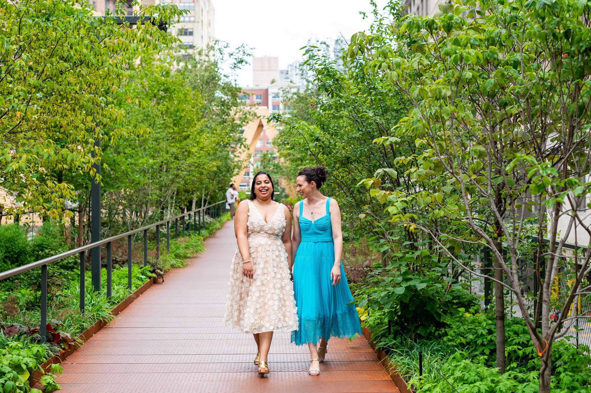 Two brides taking elopement photos on the highline in NYC