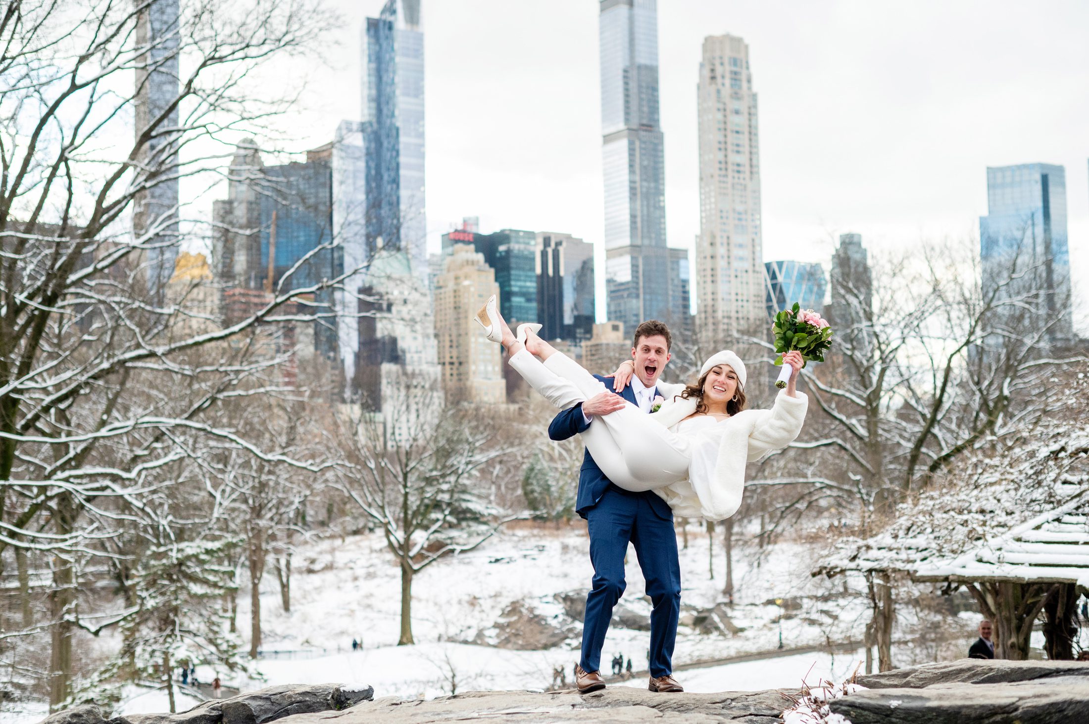 Winter elopement in Central Park in the snow 