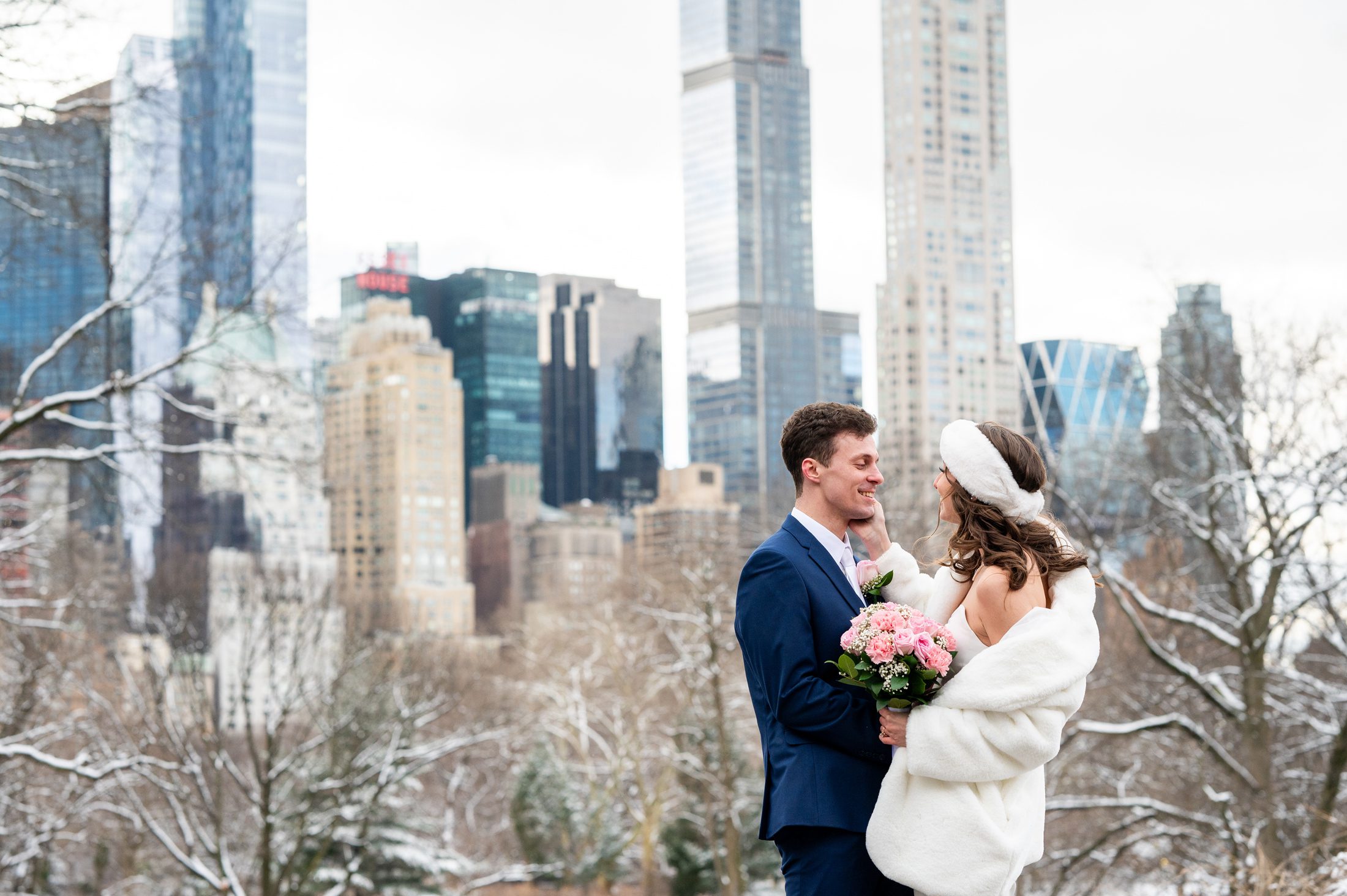Winter wedding photo with NYC Skyline in Central Park 