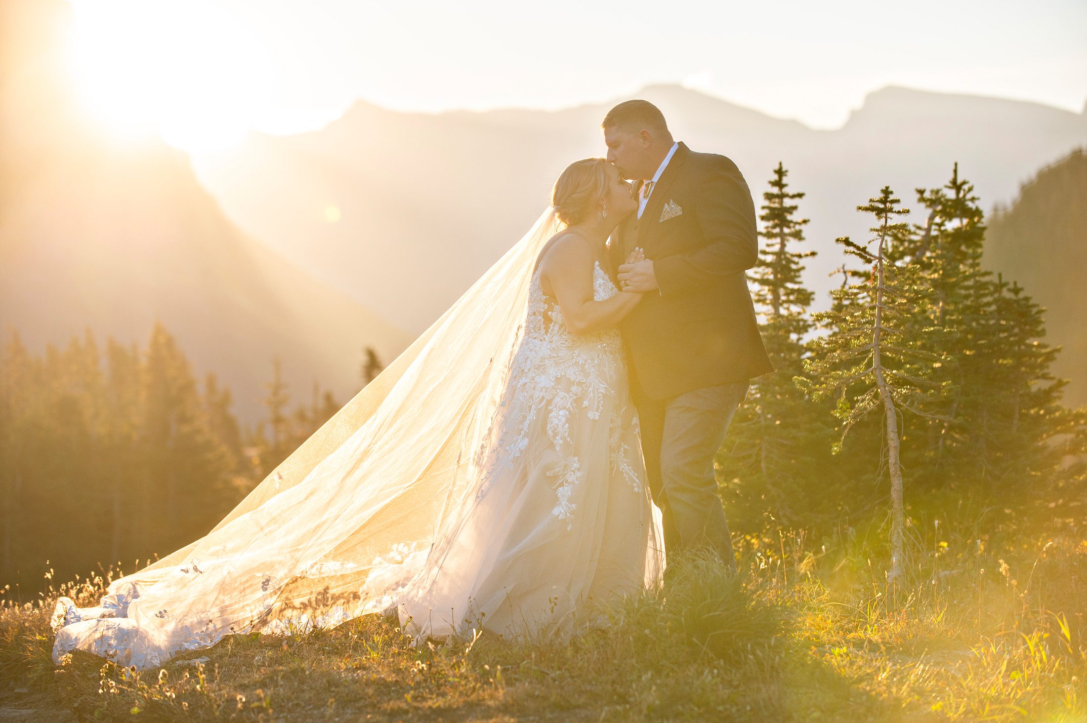Wedding photos at sunrise at Logan Pass in Glacier National Park