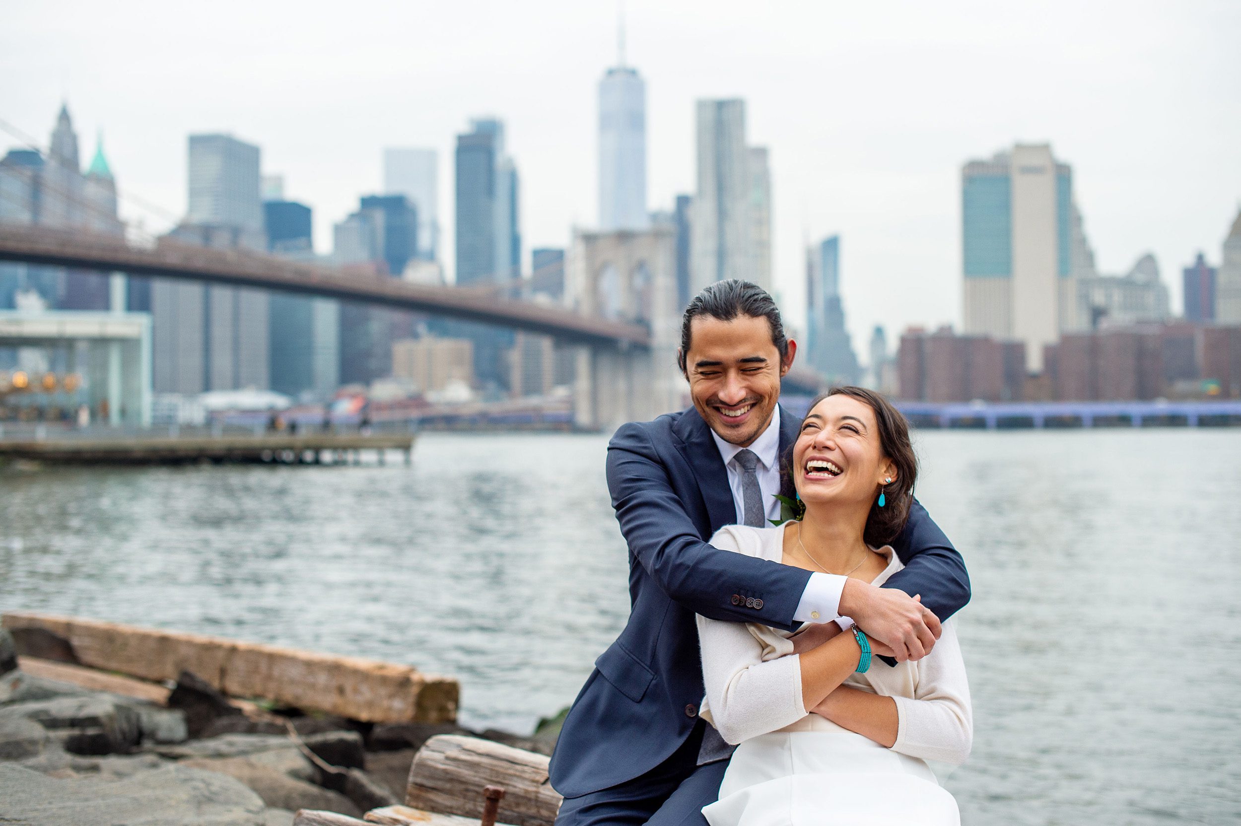 Couple after their Brooklyn Bridge Park Elopement with skyline in the background