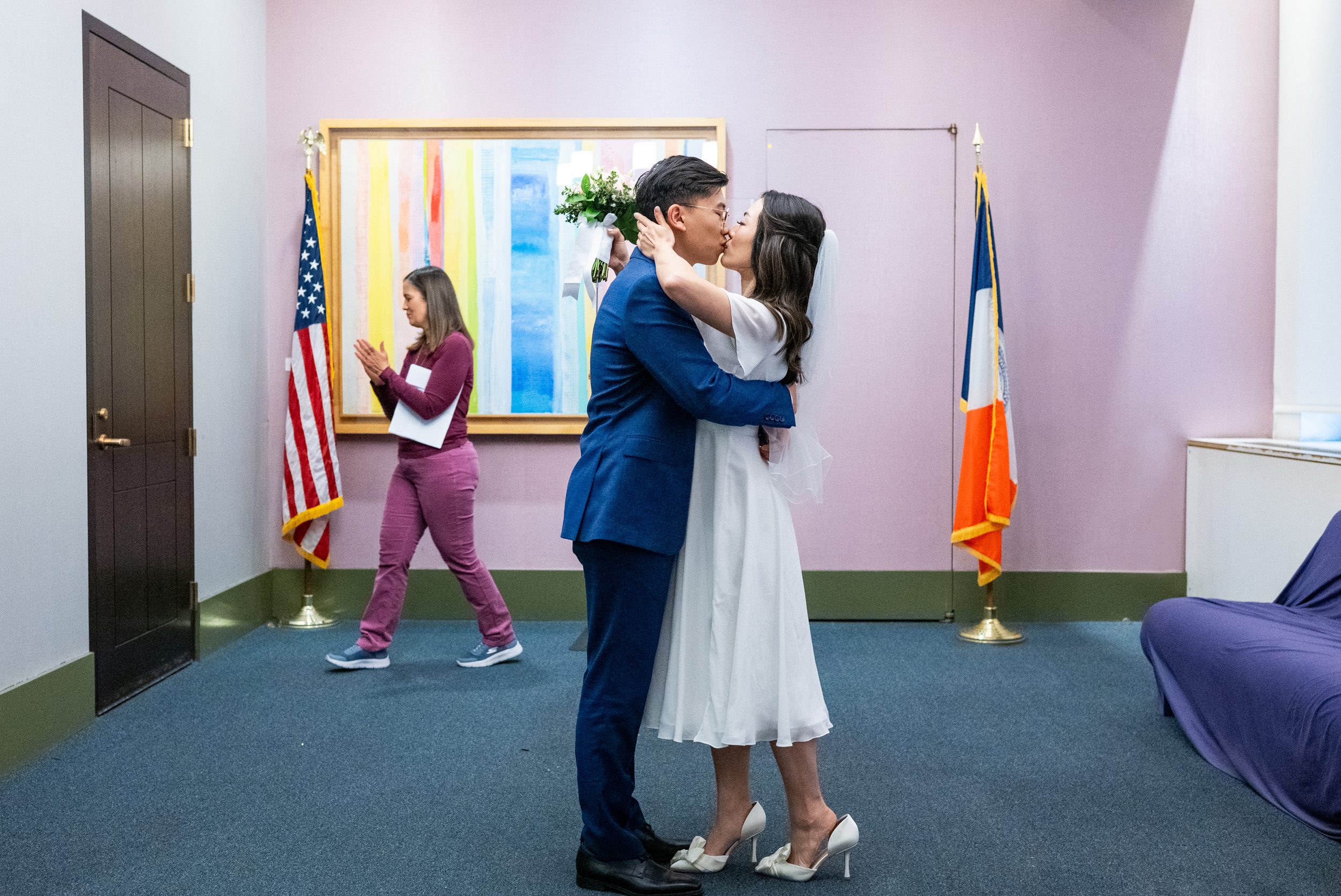 Kiss at wedding ceremony NYC City Hall Wedding