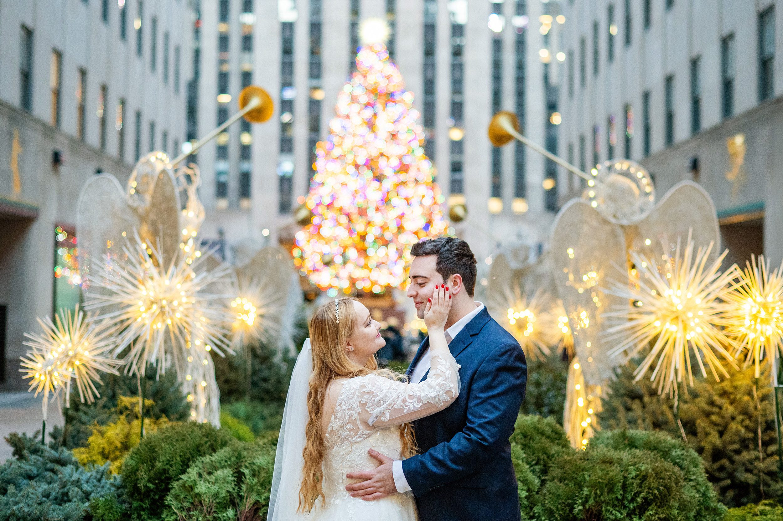 Couple eloping in NYC at Christmas time.