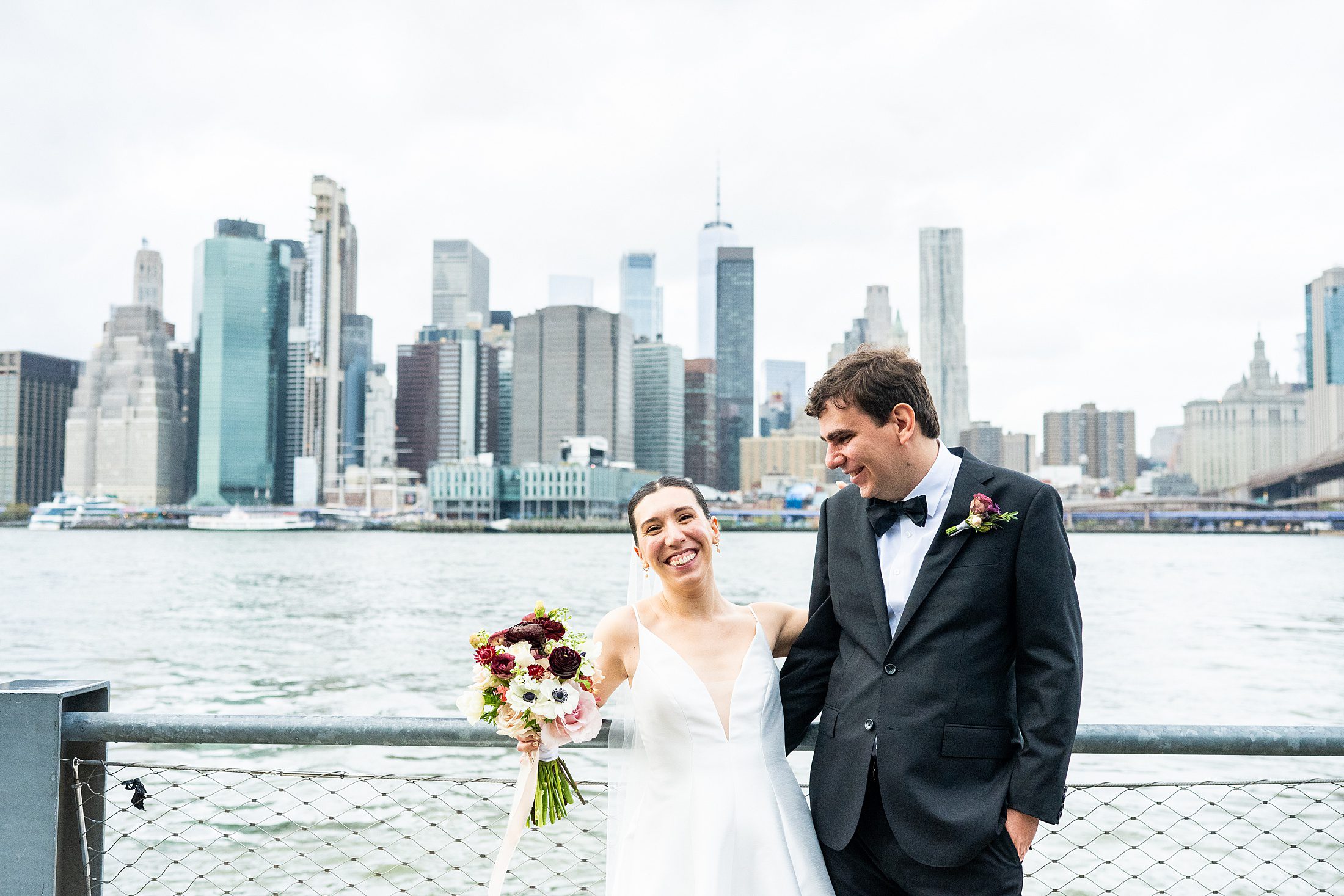 Fun wedding photos in Brooklyn Bridge Park with Bride and Groom 
