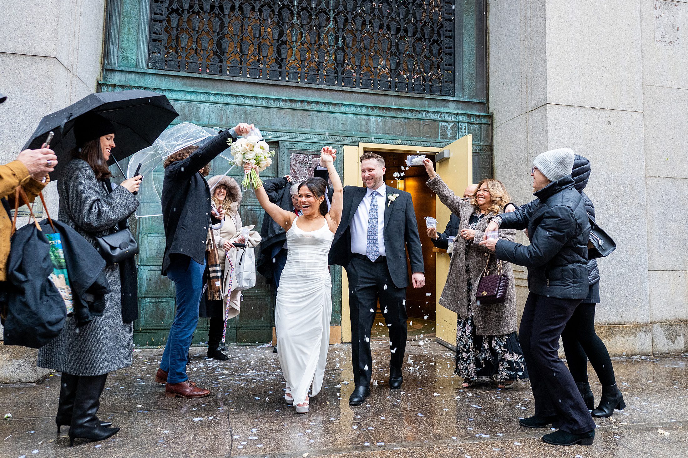 Confetti exit from Manhattan courthouse wedding in NYC