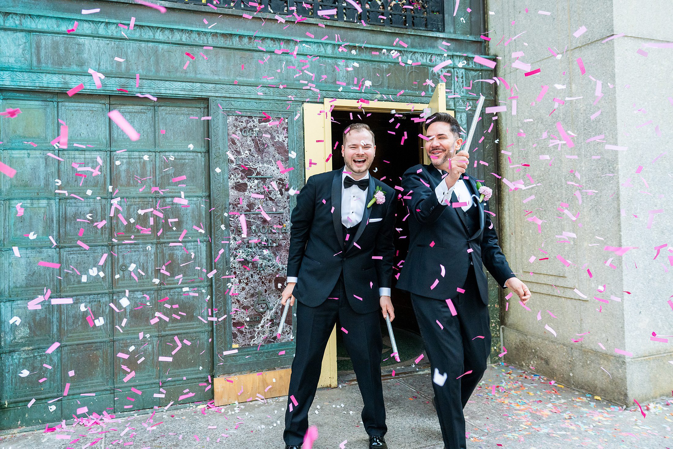 Confetti exit from City Hall after eloping in NYC 